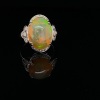 AN OPAL AND DIAMOND RING - 3