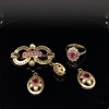 A COLLECTIONS OF ASSORTED ITEMS IN GOLD - 2
