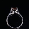 A SOLITAIRE COLOURED DIAMOND RING - 5