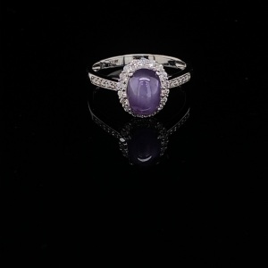 A STAR SAPPHIRE AND DIAMOND RING