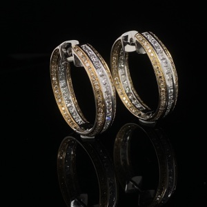 A PAIR OF DIAMOND HOOP EARRINGS