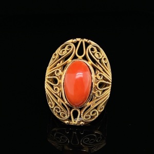 A CORAL AND DIAMOND RING