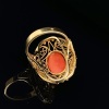A CORAL AND DIAMOND RING - 2