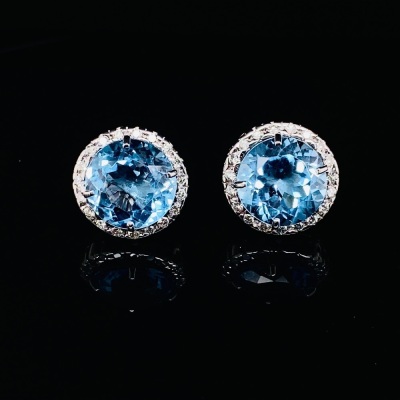 A PAIR OF TOPAZ AND DIAMOND CLUSTER EARRINGS