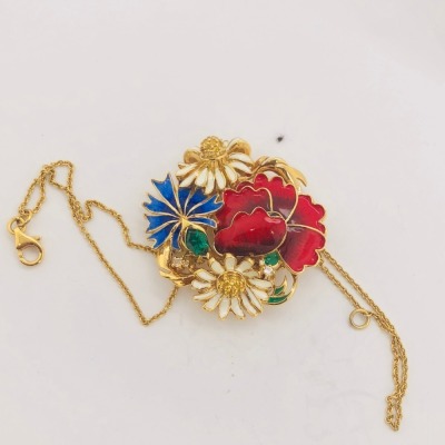 A SILVER GILT ENAMELLED BRACELET