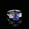 A SAPPHIRE AND DIAMOND RING