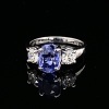 A SAPPHIRE AND DIAMOND RING - 6