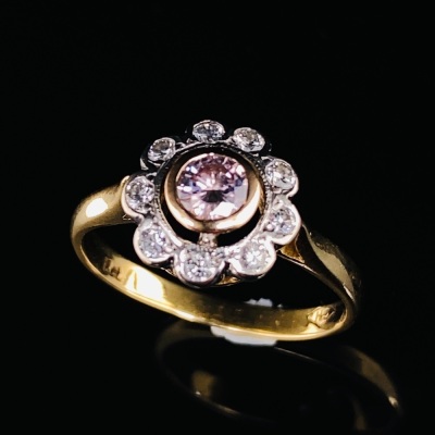 A PINK ARGYLE DIAMOND FLOWER CLUSTER RING