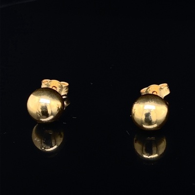 A PAIR OF STUDS IN 18CT GOLD