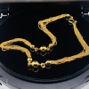 A MULTI STRAND NECKLACE IN 18CT GOLD - 3