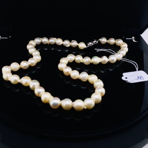 A STRAND OF BAROQUE AKOYA CULTURED PEARLS