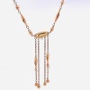 A MID CENTURY DROP PENDANT NECKLACE IN 9CT GOLD