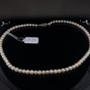 A STRAND OF AKOYA PEARLS