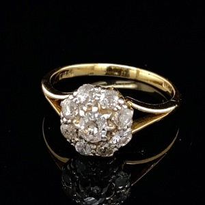 AN ANTIQUE AUSTRALIAN DIAMOND CLUSTER RING BY WILLIAM DRUMMOND