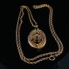 AN ANTIQUE LOCKET AND CHAIN - 4