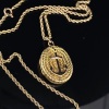 AN ANTIQUE LOCKET AND CHAIN - 5