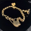 AN ANTIQUE GOLD BRACELET WITH FOB & NATURAL NUGGET CHARM - 4