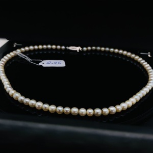 A STRAND OF AKOYA PEARLS