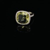 A YELLOW CITRINE AND DIAMOND DRESS RING