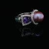 A PEARL AND DIAMOND RING - 3