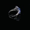 A SAPPHIRE AND DIAMOND FLOWER CLUSTER RING - 4