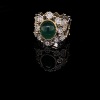 AN EMERALD AND DIAMOND RING