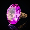 A MID CENTURY SYNTHETIC PINK SAPPHIRE RING