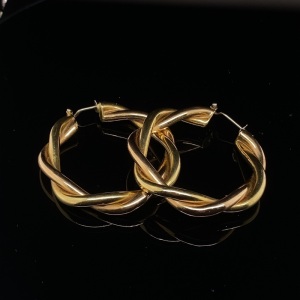 A PAIR OF GOLD EARRINGS