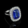 A TANZANITE AND DIAMOND RING - 5