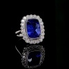 A TANZANITE AND DIAMOND RING - 6