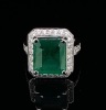 AN EMERALD AND DIAMOND CLUSTER RING - 2