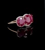 A THREE STONE RUBY AND DIAMOND RING