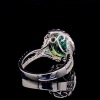 AN EMERALD AND DIAMOND CLUSTER RING - 6