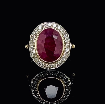 A RUBY AND DIAMOND CLUSTER RING