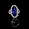 A TANZANITE AND DIAMOND CLUSTER RING - 4