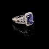 A TANZANITE AND DIAMOND CLUSTER RING - 3