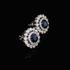 A PAIR OF BURMESE SAPPHIRE AND DIAMOND CLUSTER EARRINGS