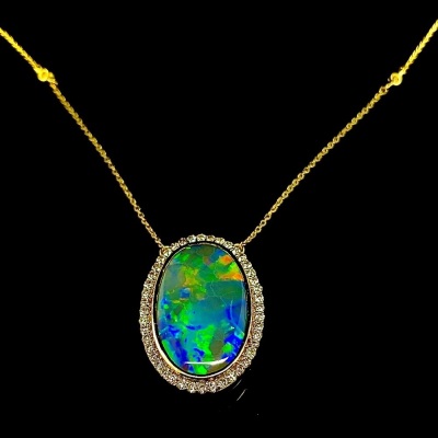 AN OPAL AND DIAMOND PENDANT NECKLACE