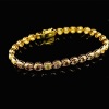 A FANCY COLOURED DIAMOND LINE BRACELET - 6