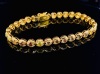 A FANCY COLOURED DIAMOND LINE BRACELET - 7