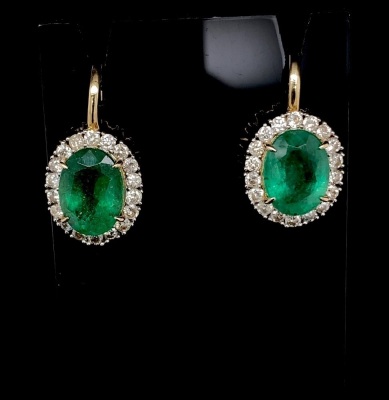 A PAIR OF EMERALD AND DIAMOND EARRINGS