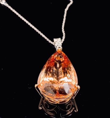 A MORGANITE AND DIAMOND PENDANT NECKLACE