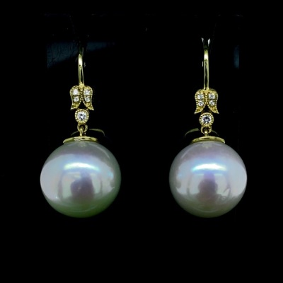 A PAIR OF PEARL AND DIAMOND DROP EARRINGS