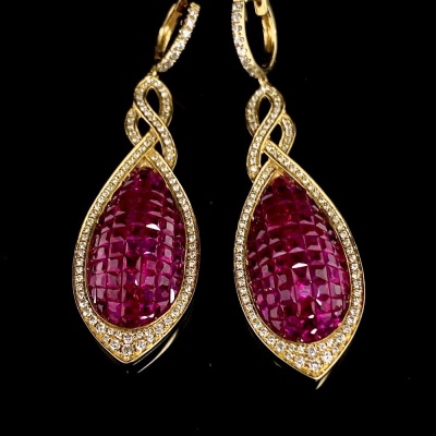 A PAIR OF RUBY AND DIAMOND EARRINGS