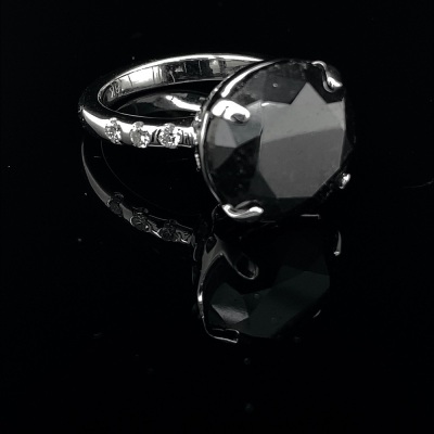 A BLACK DIAMOND RING