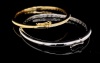 A PAIR OF GOLD AND DIAMOND HINGED BANGLES - 3