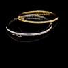 A PAIR OF GOLD AND DIAMOND HINGED BANGLES - 4