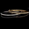 A PAIR OF GOLD AND DIAMOND HINGED BANGLES - 5