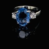 A SAPPHIRE AND DIAMOND RING