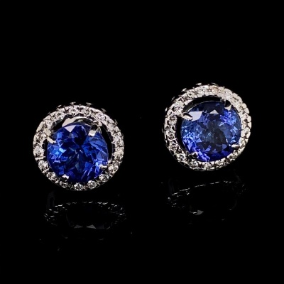 A PAIR OF TANZANITE AND DIAMOND STUDS